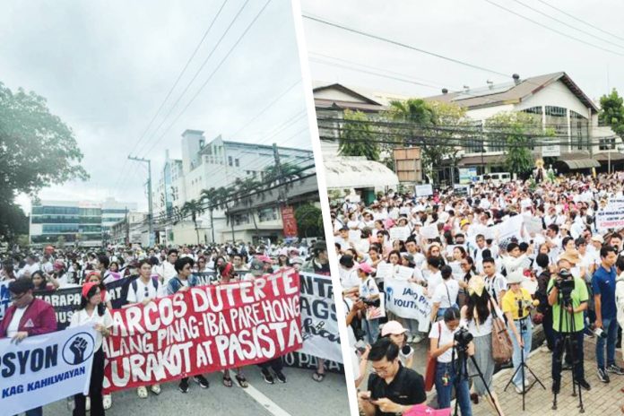 iloilo-protesters Two simultaneous marches — one from Jaro Plaza and another from the University of the Philippines Visayas — converged at the Iloilo Provincial Capitol in Iloilo City at 3 p.m. yesterday, with protesters chanting and carrying placards denouncing what they called the “trillion-peso robbery” in government. AJ PALCULLO/PN
