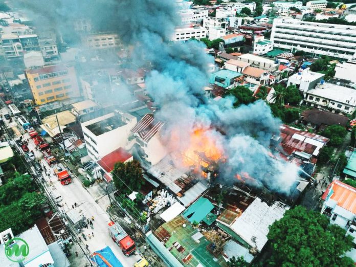 This aerial photo shows a fire that broke out on Jalandoni Street, Jaro, Iloilo City on Wednesday, Sept. 24, 2025. Seven houses were gutted. MORE POWER PHOTO