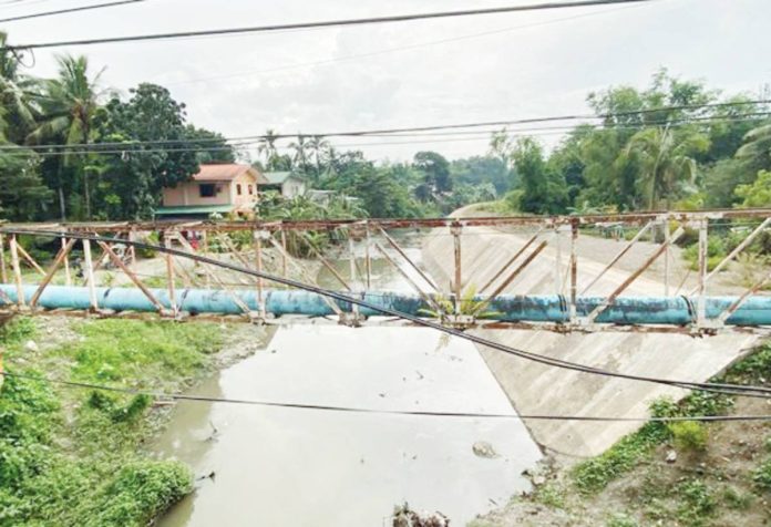 This flood mitigation structure in Buntatala Creek, Jaro, Iloilo City suffered delays due to informal settlers and waterline relocations.