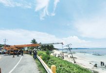Crews from the National Grid Corporation of the Philippines and Aklan Electric Cooperative rush to stabilize poles along the beachside perimeter after Boracay Island and nearby Aklan towns suffered a weekend-long blackout. AKELCO FB PAGE PHOTO