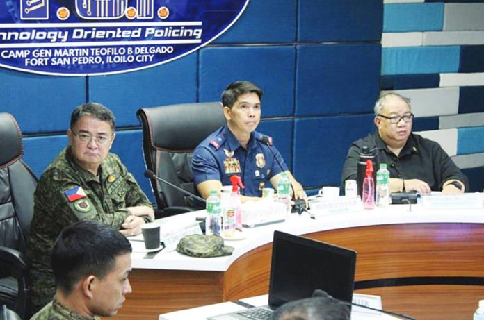 mai_terror_financing.JPG_resized The State is resolute in cutting off terrorism financing in Western Visayas, declare (from left) Colonel Erwin Lamzon of the Philippine Army’s 3rd Infantry Division, Police Brigadier General Josefino Ligan of the Police Regional Office 6, and Prosecutor II Flosemer Chris Gonzales of the Regional Task Force to End Local Communist Armed Conflict, during a press briefing in Iloilo City on the filing of terrorism financing charges against two rebel suspects. AJ PALCULLO/PN