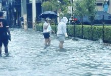 Motorists and pedestrians brave flooded streets in Iloilo City as Tropical Storm “Opong” unleashes hours of relentless rain, submerging 88 barangays across all seven districts. AJ PALCULLO/PN