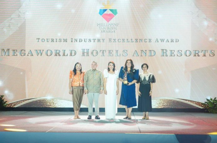 MEGAWORLD’S HOTEL GROUP BAGS DOT’S TOURISM INDUSTRY EXCELLENCE AWARD. Setting a new milestone in the Philippine tourism sector, Megaworld Hotels & Resorts was honored by the Department of Tourism (DOT) with its inaugural Tourism Industry Excellence Award — making it the first and only hospitality group to earn this recognition. The award highlights the company’s stature as the Philippines’ largest hotel operator and its distinction as the country’s first Muslim-friendly hotel chain as certified by Crescent Rating. The group has also been commended for championing Filipino culture and enriching guest experiences through its pioneering Sampaguita Project, which uses the Philippine national flower in its guests’ experiences and hotel touchpoints. Receiving the award from DOT Secretary Christina Frasco (center), along with DOT undersecretaries Verna Esmeralda Buensuceso and Maria Rica Bueno, were Megaworld Hotels & Resorts Group GM Arturo Boncato, Jr. (2nd from left) and Managing Director Cleofe Albiso (2nd from right).