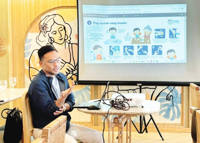 A health officer explains the proper steps of insulin injection during the Diabetes Mellitus Technical Working Group meeting in Iloilo, where strategies for early detection and management of Type 1 diabetes among the youth were discussed. ILOILO PROVINCIAL HEALTH OFFICE PHOTO