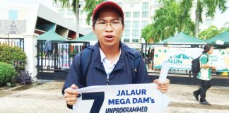 Jalaur River for the People’s Movement spokesperson Arlie Bosque voices strong opposition to the Jalaur mega dam project during a protest in Iloilo City, stressing, “Our call extends beyond merely reviewing the dam project; it’s a plea to prioritize public welfare, especially in education and health, over infrastructural projects that serve to deepen corruption.” NELJOY N. GALIGAO /PN