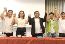Pavia, Iloilo’s Sangguniang Bayan member JP Peñol (fifth from right) raises hands with his slate “Team Da Best PCL Iloilo” as they present a united front ahead of the Philippine Councilors League (PCL) Iloilo Chapter election on September 12, 2025. Peñol is running for president. His vice president is Sangguniang Bayan member Christy Love Custodio-Margarico of Guimbal (sixth from right). NELJOY GLAIGAO/PN