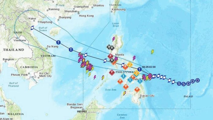 A forecast map of the Philippine Atmospheric Geophysical and Astronomical Services Administration shows the projected track of Tropical Storm “Opong” as it moves westward across the Philippines toward Vietnam. Authorities warn of heavy rains, strong winds, and possible flooding.