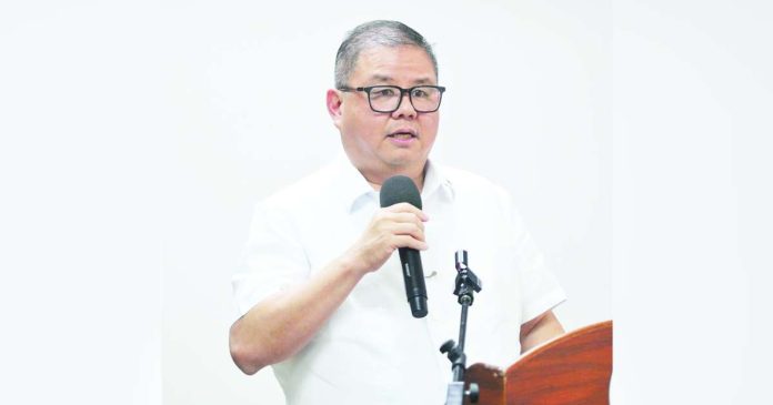rice import ban copy_superimposed TIU LAUREL. DA PHOTO