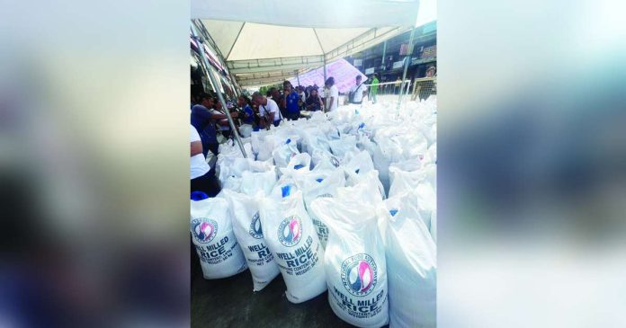 rice program_superimposed The Bacolod City Government procured 5,880 sacks of rice for the initial rollout of “Benteng Bigas Meron Na!” program in the city in June this year. For the second tranche, about 3,000 sacks are expected to be purchased. CARMELA ARCOLAS GAMBOA/FACEBOOK PHOTO