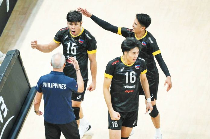 sports Alas Alas Pilipinas head coach Angiolino Frigoni talks to his star hitter Marck Espejo. PHOTO COURTESY OF VOLLEYBALL PHILIPPINES