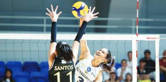 Negrense Diza Berayo of National University-Nazareth School Lady Bullpups tries to score against Aneeza Santos of University of Santo Tomas Junior Golden Tigresses. UAAP PHOTO
