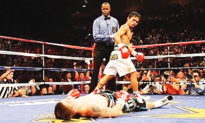Ricky Hatton lies on the canvas after being knocked out by Manny Pacquiao during their world title fight at the MGM Grand, Las Vegas, Nevada, USA in May 2009. PA
