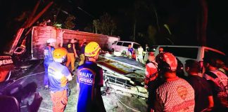 Responders from the Nabas, Malay, and Ibajay Municipal Disaster Risk Reduction and Management Offices, and other agencies conduct clearing operations after a 10-vehicle collision in Barangay Libertad, Nabas, Aklan on Monday night, Oct. 20, 2025. The incident, caused by a wing van that allegedly lost its brakes, was declared a mass casualty incident. RADYO TODO AKLAN 88.5 FM PHOTO