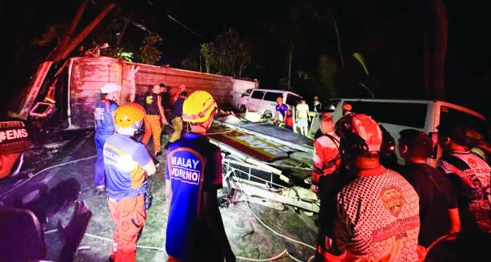 Aklan accident_compressed Responders from the Nabas, Malay, and Ibajay Municipal Disaster Risk Reduction and Management Offices, and other agencies conduct clearing operations after a 10-vehicle collision in Barangay Libertad, Nabas, Aklan on Monday night, Oct. 20, 2025. The incident, caused by a wing van that allegedly lost its brakes, was declared a mass casualty incident. RADYO TODO AKLAN 88.5 FM PHOTO