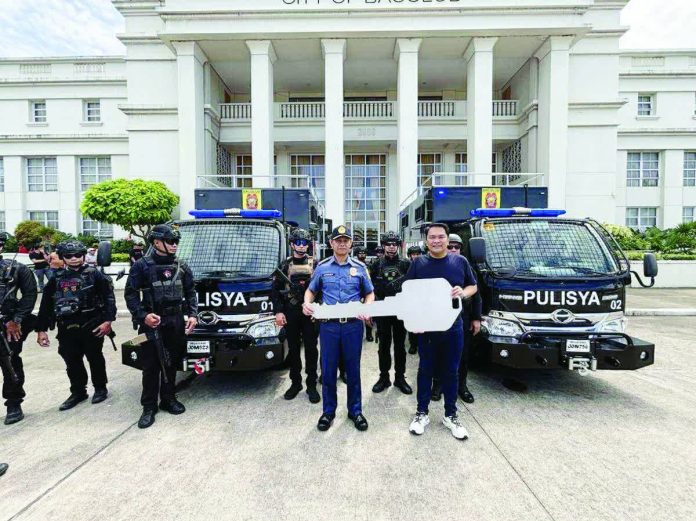 Bacolod_SWAT_vans_copy_resized_compressed Bacolod City’s Mayor Greg Gasataya turned over two SWAT armored vehicles to the Bacolod City Police Office, led by Colonel Joeresty Coronica, along with the SWAT team, on October 29 at the Bacolod City Government Center grounds. MAE SINGUAY/PN