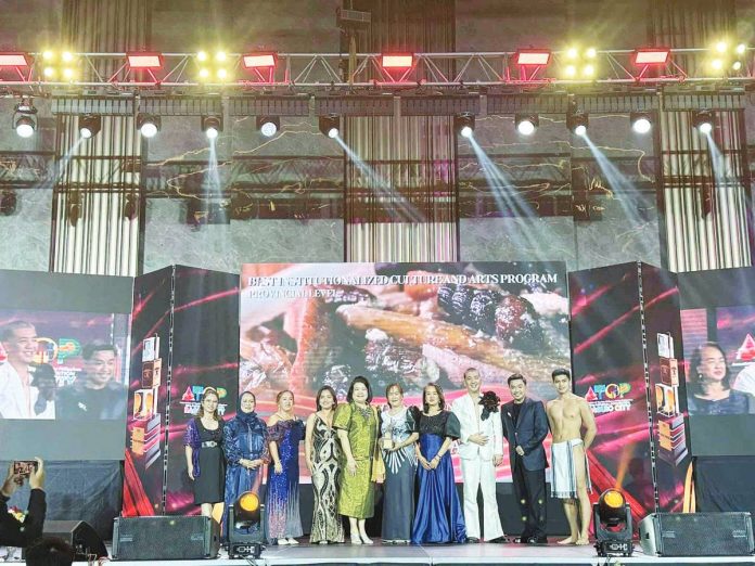 Capiz_awards_copy_resized Capiz Provincial Tourism and Cultural Affairs Office representatives accept three top honors — Best Tourism-Oriented LGU, Best Institutionalized Program for Culture and the Arts, and Best Cultural Festival — at the 2025 ATOP Pearl Awards in Baguio City on Oct. 2, 2025. CAPIZ PROV’L GOV’T COMMUNICATIONS GROUP PHOTO