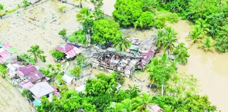 AFTERMATH OF ‘RAMIL’ IN CAPIZ. An aerial view shows damaged homes and submerged farmlands along the highway leading to Sigma, Capiz, following the devastation brought by Tropical Storm “Ramil.” CIVIL DEFENSE WV PHOTO