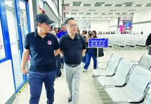 DOTr to shipping lines: ‘Implement online booking for sea trips’ Department of Transportation Acting Secretary Giovanni Lopez (left) led the inspection at the Batangas Port to ensure its readiness for the expected influx of travelers on Undas (All Saints’ and All Souls’ days). DOTR PHOTO