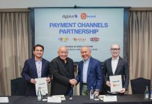 (L-R) Jasper S. Vicencio - President, AB Leisure Exponent, Inc., a DigiPlus subsidiary ; Eusebio H. Tanco - Chairman, DigiPlus Interactive, Corp. ; Atty. Ray C. Espinosa, Chairman of the Board, Bayad ; Lawrence Y. Ferrer - President & CEO, Bayad