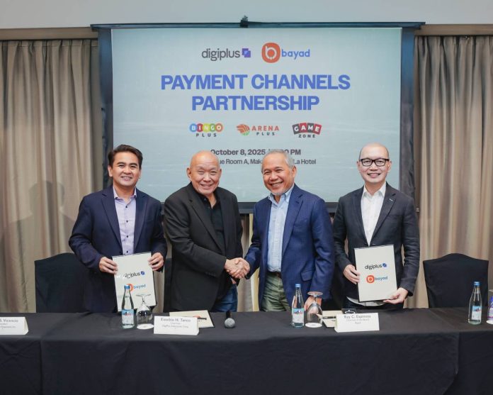 DigiPlus Bayad 1 (L-R) Jasper S. Vicencio - President, AB Leisure Exponent, Inc., a DigiPlus subsidiary ; Eusebio H. Tanco - Chairman, DigiPlus Interactive, Corp. ; Atty. Ray C. Espinosa, Chairman of the Board, Bayad ; Lawrence Y. Ferrer - President & CEO, Bayad