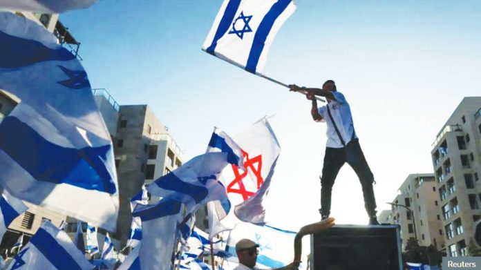Gaza Israelis celebrate the ceasefire with Hamas after two years of war. REUTERS