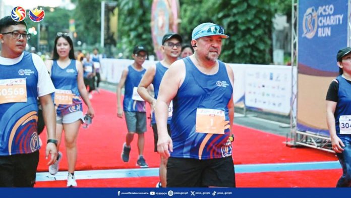 PCSO charity run1 Philippine Charity Sweepstakes office General Manager Melquiades A. Robles (left photo) leads the 2025 PCSO Charity Run on Sunday, October 12, 2025.