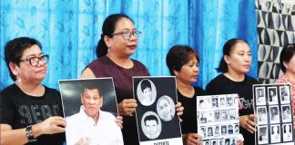 Rights advocates and family members of victims of ex-President Rodrigo Duterte’s brutal drug war gather to press for his prosecution on Saturday, a day after a pretrial chamber of the International Criminal Court rejected his request for interim release because he was a flight risk. The group welcomed the decision and was hopeful that the charges against the former president are confirmed before the end of the year. GRIG C. MONTEGRANDE, PHILIPPIN DAILY INQUIRER