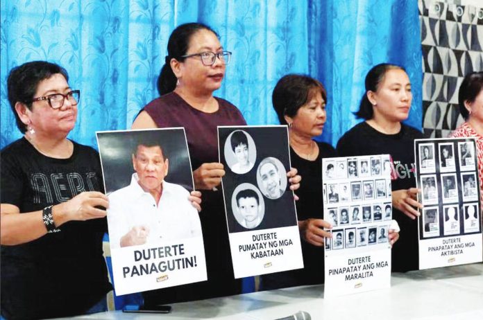 Public_opinion_copy_resized Rights advocates and family members of victims of ex-President Rodrigo Duterte’s brutal drug war gather to press for his prosecution on Saturday, a day after a pretrial chamber of the International Criminal Court rejected his request for interim release because he was a flight risk. The group welcomed the decision and was hopeful that the charges against the former president are confirmed before the end of the year. GRIG C. MONTEGRANDE, PHILIPPIN DAILY INQUIRER