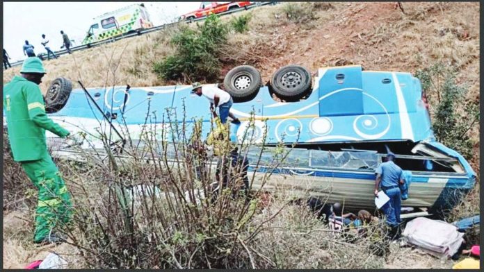 South_Africa_copy_resized_resized This blue and white bus, carrying Malawian and Zimbabwean nationals, is seen on its roof just off the N1 highway after tumbling down. BBC