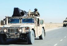 Taliban kills 58 Pakistani troops in border attacks A man with his face covered stands atop a military vehicle patrolling Shorabak district near the Afghanistan-Pakistan border. AFP VIA GETTY IMAGES
