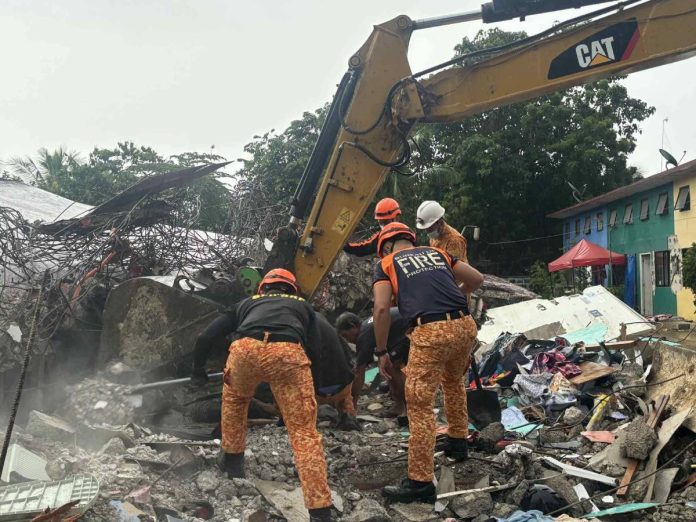 cebu quake The Bureau of Fire Protection Region 7's Special Rescue Force conduct retrieval and rescue operations in the aftermath of the 6.9 magnitude earthquake that struck Bogo City, Tabogon and San Remigio towns, and nearby areas in Cebu Province, on October 1, 2025. BFP REGION 7 PHOTO