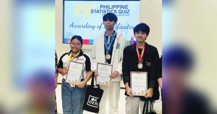 kalibo student tops copy_superimposed_compressed Winners of the 29th Philippine Statistics Quiz Provincial Level receive medals, certificates of recognition, cash prizes, and tokens: (From left) second placer Floriebhe Pearl R. Venturanza, first placer Justin Lei D. Dioso, and third placer Gabriel Zachary C. Cuales. PSA AKLAN PHOTO