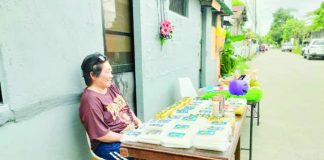 “I’ve been selling here for many years. This is our livelihood,” says candle vendor Gina Garbino of Jaro, Iloilo City. “Right now, sales are still slow since it’s not yet October 31 or November 1, but we’ve already started displaying our candles in case people start buying early.” MA. THERESA LADIAO/PN