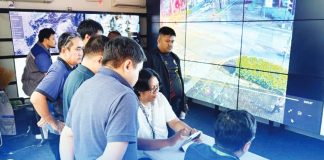 City Disaster Risk Reduction and Management Office personnel closely monitor possible quake impacts in Iloilo City through real-time surveillance feeds at the ICARE Mandurriao operations center. MA. THERESA LADIAO/PN
