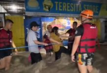 Members of the Bureau of Fire Protection (BFP)-Bacolod City conducted rescue operations in Purok Carvic, Barangay Mandalagan, late evening of October 9, after heavy rainfall caused flooding that affected 12 barangays in the city. SCREENGRAB FROM BOMBO RADYO BACOLOD