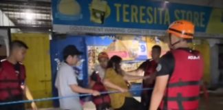 Members of the Bureau of Fire Protection (BFP)-Bacolod City conducted rescue operations in Purok Carvic, Barangay Mandalagan, late evening of October 9, after heavy rainfall caused flooding that affected 12 barangays in the city. SCREENGRAB FROM BOMBO RADYO BACOLOD
