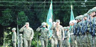 Lieutenant General Antonio Nafarrete, commanding general of the Philippine Army, confers awards to outstanding Spearhead Troopers during his visit to Camp Peralta in Jamindan, Capiz.