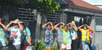 Residents of Barangay Talokgangan in Banate, Iloilo, rush to higher ground as church bells ring during a simulated tsunami alert on October 23, 2025. The drill, part of a regionwide preparedness exercise, demonstrated how traditional warning systems can still save lives in modern disaster response. PHOTO FROM PDRRMO-ILOILO