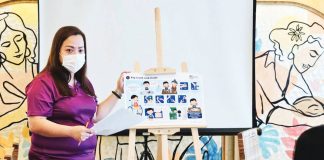 A health educator from the Iloilo Provincial Health Office presents illustrated materials on proper insulin administration during a consultation meeting with parents and children living with Type 1 Diabetes. ILOILO PROVINCIAL HEALTH OFFICE PHOTO