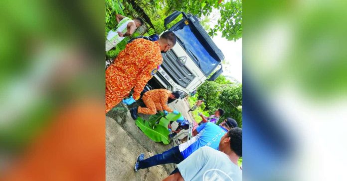 passi accident_superimposed_compressed A delivery truck accidentally ran over a motorcycle in Barangay Jaguimitan, Passi City, Iloilo on Thursday, Oct. 30, 2025. PASSI CITY RESPONDERS IN DISASTERS AND EMERGENCIES PHOTO