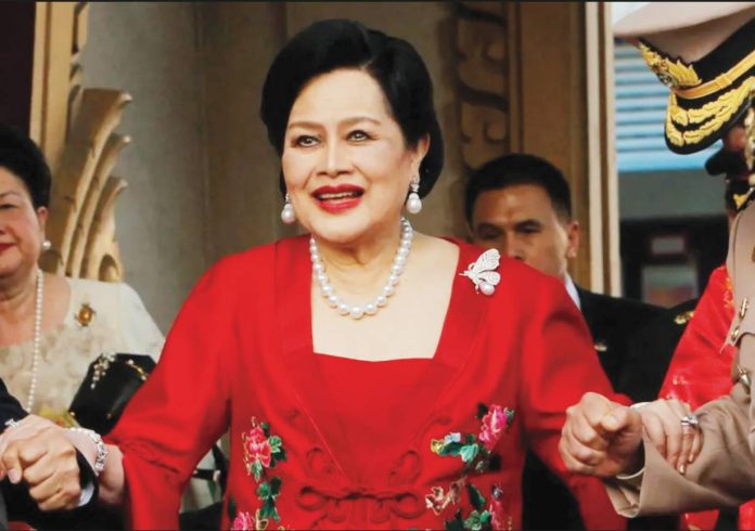 sirikit Queen Sirikit is helped down a staircase by guards in uniform in this undated photo. REUTERS