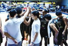 Bacolod Tubo Slashers during a huddle in their recent MPBL match. MPBL PHOTO