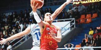 Mapua University Cardinals’ Clint Escamis evaded his Arellano University Chiefs defender for a layup. PHOTO COURTESY OF NCAA/GMA SYNERGY