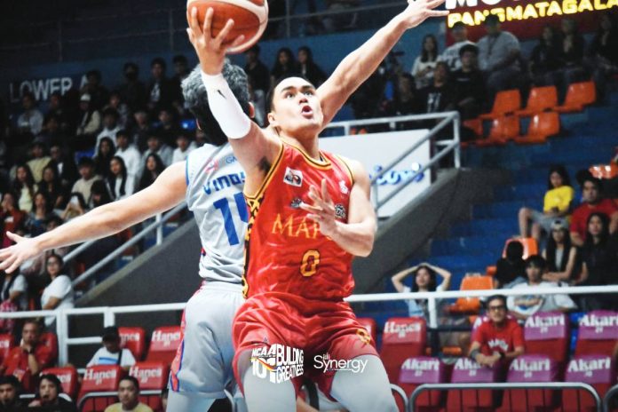 sports Escamis Mapua University Cardinals’ Clint Escamis evaded his Arellano University Chiefs defender for a layup. PHOTO COURTESY OF NCAA/GMA SYNERGY