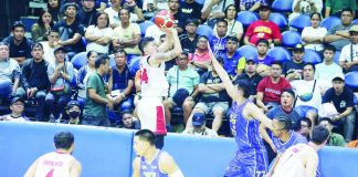 Barangay Ginebra San Miguel Kings’ Sonny Estil pulls up for a shot against the defense of TNT Tropang Giga’s Kevin Ferrer. PBA PHOTO