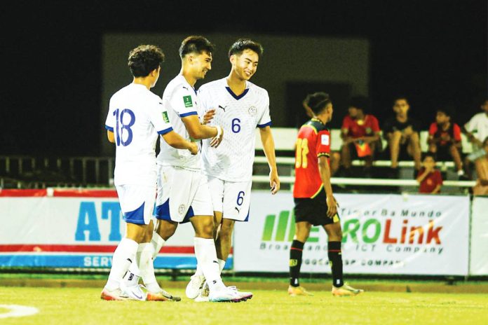 sports Kris HAT-TRICK PLUS ONE. Bjorn Martin Kristensen (center) celebrates after scoring all four goals in the Philippine Men’s Football Team’s 4–1 victory over Timor-Leste in the AFC Asian Cup 2027 Qualifiers. AFC PHOTO