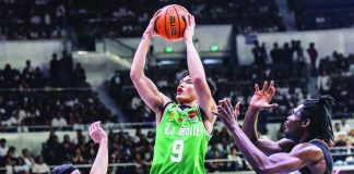 De La Salle University’s Manuel Luis Pablo soars for a basket against University of the Philippines’ defense. UAAP PHOTO