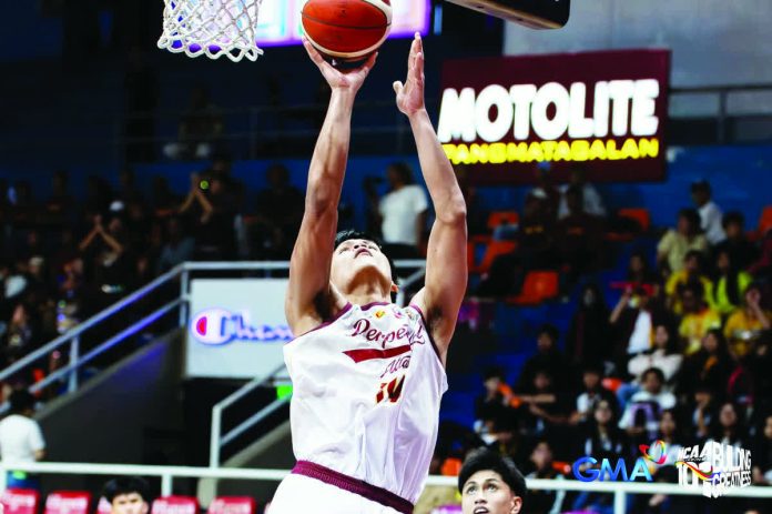 John Cedrick Abis rises to the occasion for the University of Perpetual Help Altas. COURTESY OF NCAA/GMA SPORTS