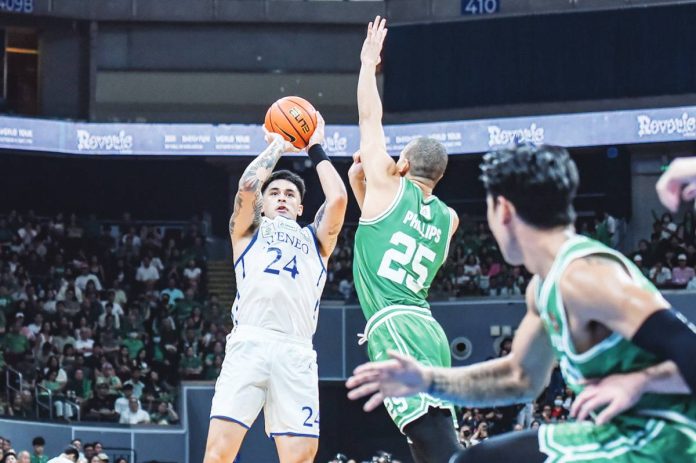 Ateneo de Manila University Blue Eagles’ Dom Escobar pulls up a shot against the defense of De La Salle University Green Archers' Michael Phillips. UAAP PHOTO
