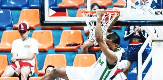 College of St. Benilde’s SJ Moore finishes with a two-handed dunk against Letran. PHOTO COURTESY OF NCAA/GMA SPORTS
